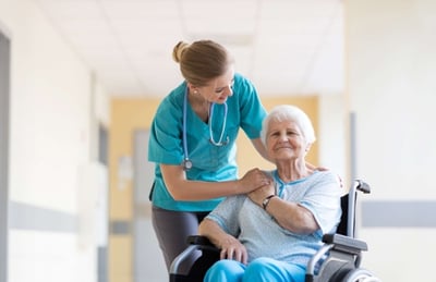 Nurse working with elderly patient